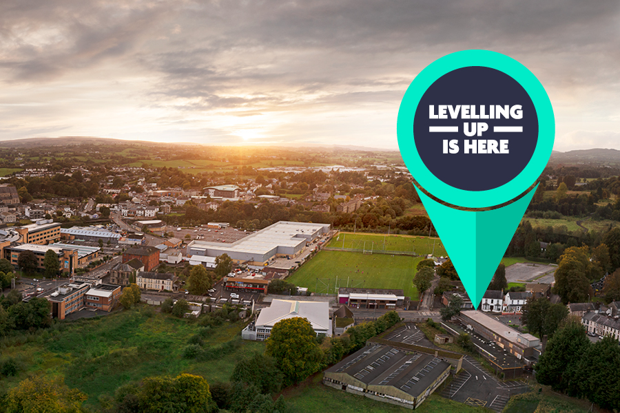Levelling Up logo shown pinned to a photo of Omagh Innovation Hub in Omagh