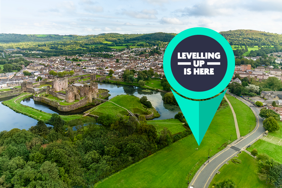 Levelling Up logo shown pinned to a photo of Caerphilly